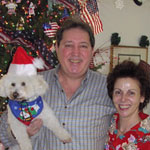 Photo of John & Diana Martakis with their dog.