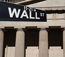 Image of Wall Street sign. Link to Closely Held Stock.